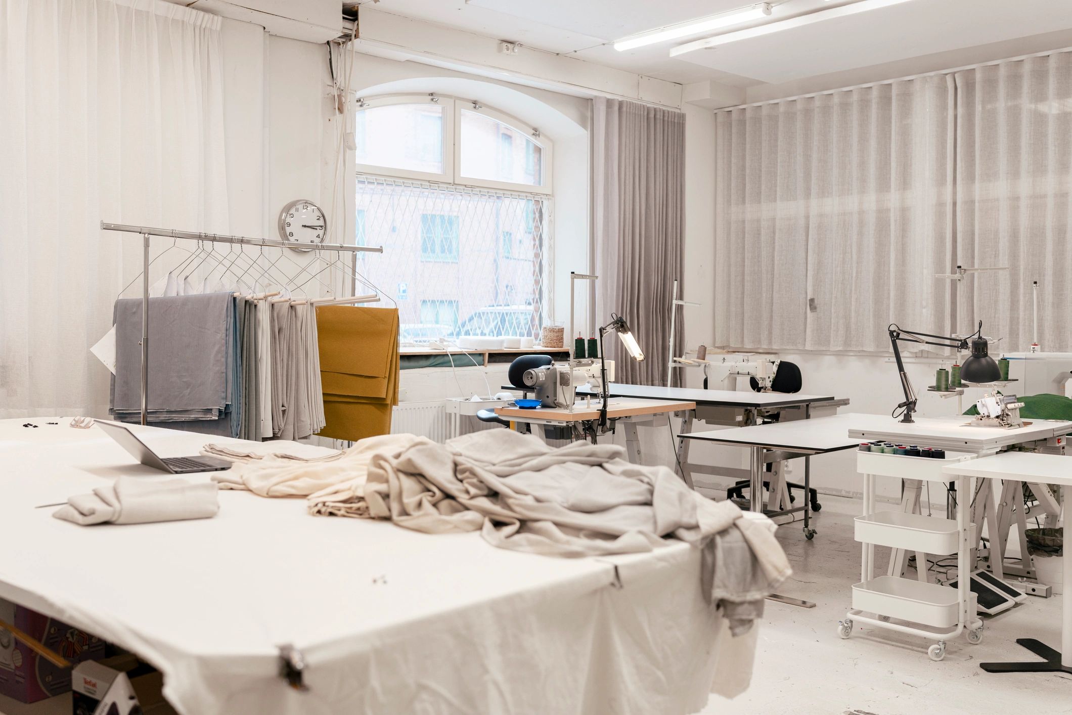 Fashion atelier with sewing machines and fabrics