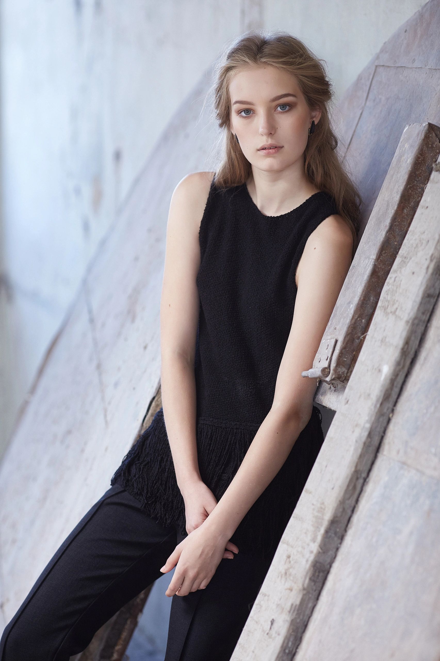 Woman wearing a black tailored Novation look
